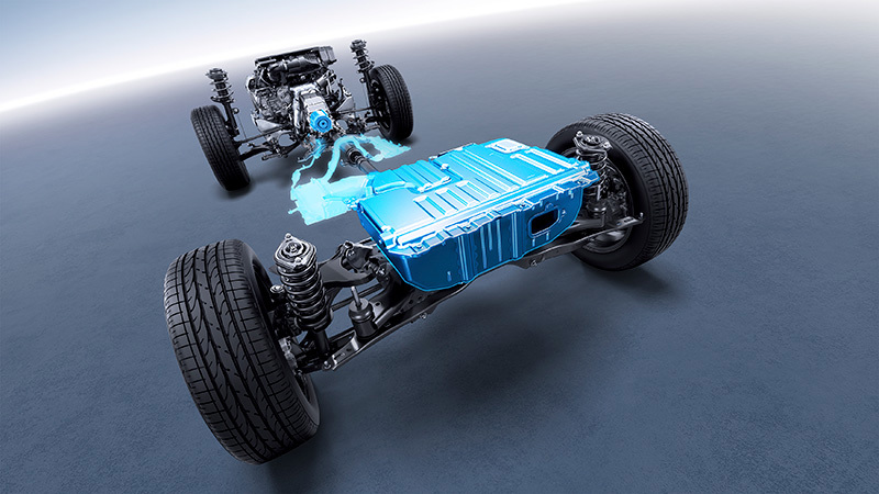 Grafisk illustration, der viser, hvordan Subarus boxermotor arbejder sammen med en elmotor – for at give effektiv kraftoverførsel, lavere emissioner og forbedret brændstoføkonomi.